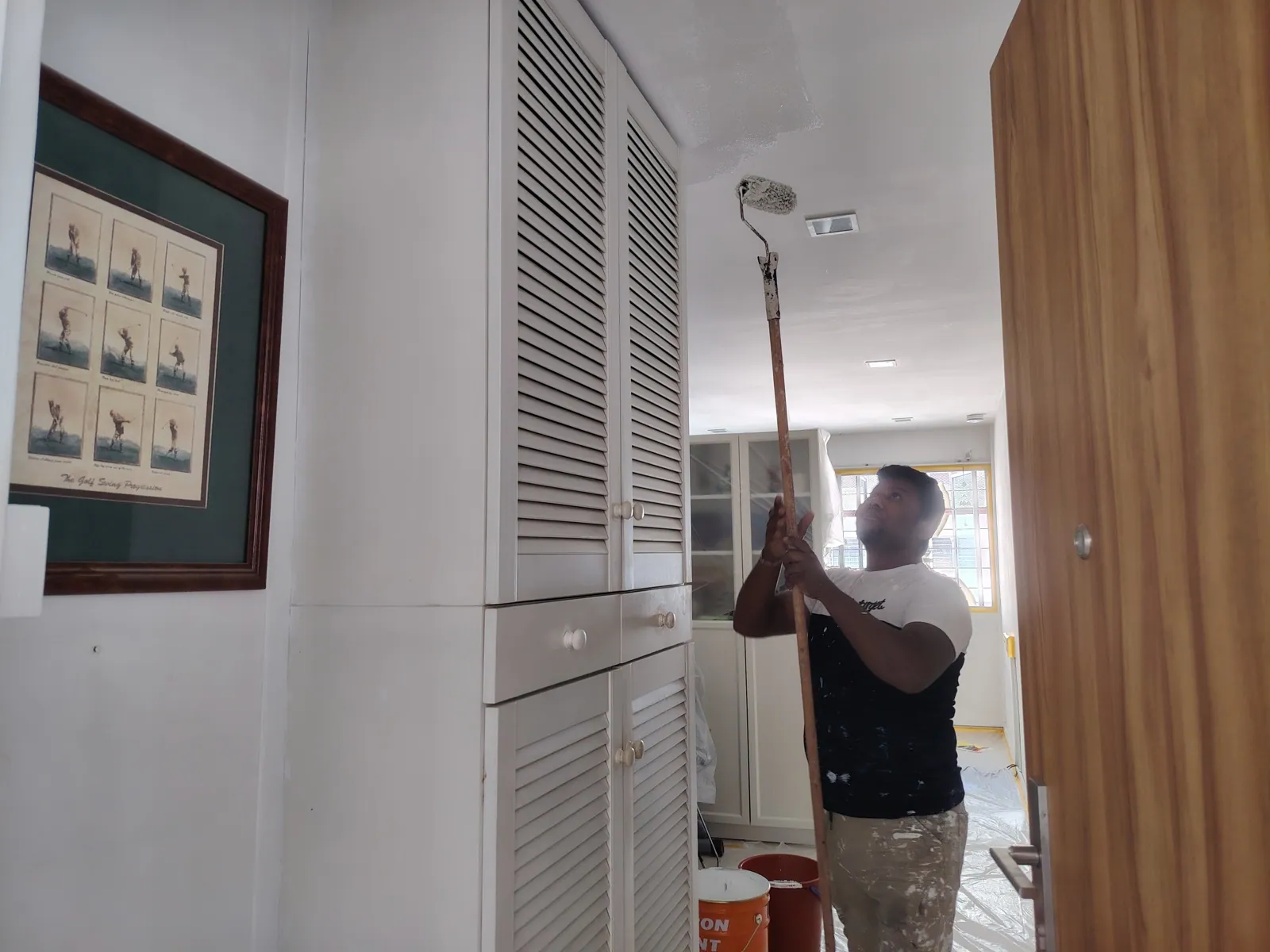 Our team painting the ceiling.